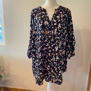 Pink and white floral with black background.  V neck with 3/4 sleeve w/buttons